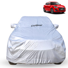 CarBinic Car Cover for Maruti Swift 2018 Water Resistant (Tested) and Dustproof Custom Fit UV Heat Resistant Outdoor Protection with Triple Stitched Fully Elastic Surface | Silver with Pockets